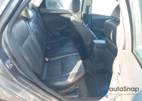 2013 Ford Focus Titanium z USA, uszkodzony, nr VIN 1FADP3N21DL177448